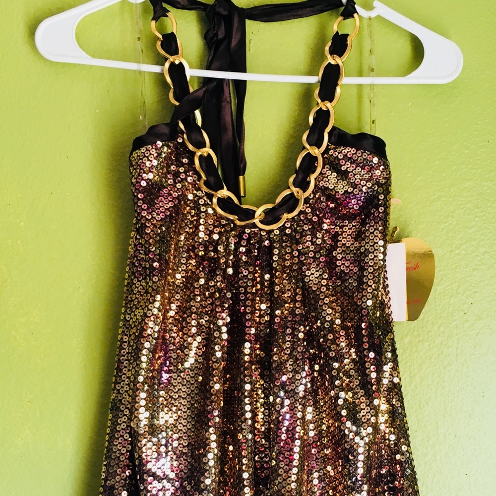 Apple bottoms. sequins top